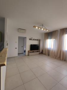 TV a/nebo společenská místnost v ubytování La suite di Carola + 5 fotografií