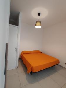 Postel nebo postele na pokoji v ubytování La suite di Carola