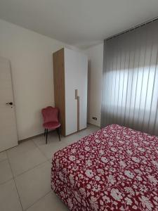 Postel nebo postele na pokoji v ubytování La suite di Carola
