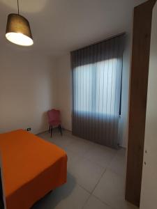 Postel nebo postele na pokoji v ubytování La suite di Carola