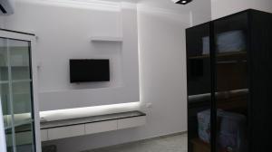 TV o dispositivi per l'intrattenimento presso Bar Restorant Hotel Rama