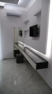 TV o dispositivi per l'intrattenimento presso Bar Restorant Hotel Rama
