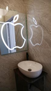 Bagno di Bar Restorant Hotel Rama
