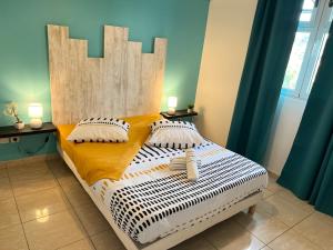 Tempat tidur dalam kamar di Effet Mer