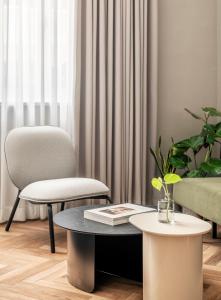 Area soggiorno di Noel Suites