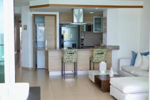 Dapur atau dapur kecil di MarbellaTower-JuanDolio-SEAVIEW-FRONTBEACH-Cozy-2BR-3BDS-6PAX-WiFi