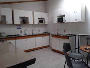 Kuchyň nebo kuchyňský kout v ubytování Homerent