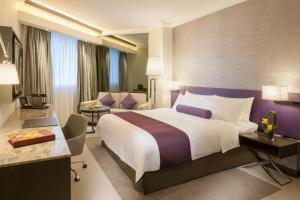 Krevet ili kreveti u jedinici u objektu Gateway Hotel, Marco Polo