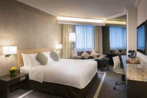 Krevet ili kreveti u jedinici u objektu Gateway Hotel, Marco Polo