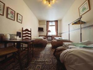 Postel nebo postele na pokoji v ubytování Garden Pension Obergurgl