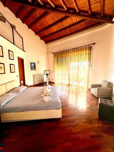 Giường trong phòng chung tại Villa Giovina Mondello