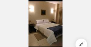 Gulta vai gultas numurā naktsmītnē Mandala Apartments