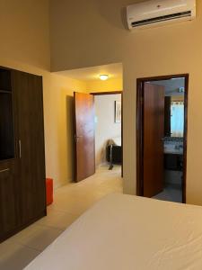 Gulta vai gultas numurā naktsmītnē Mandala Apartments