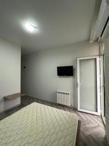 TV a/nebo společenská místnost v ubytování Gonio Tower