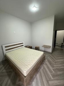 Voodi või voodid majutusasutuse Gonio Tower toas