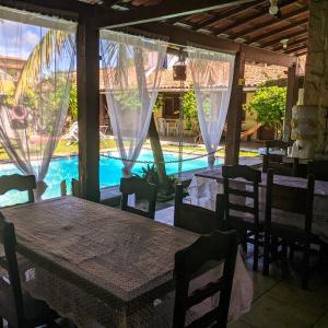 A piscina localizada em Pousada Roça Velha ou nos arredores