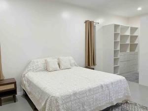 Letto o letti in una camera di TnT Home