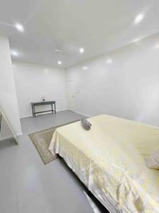 Letto o letti in una camera di TnT Home