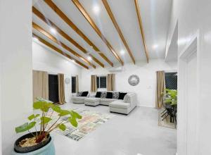 Area soggiorno di TnT Home