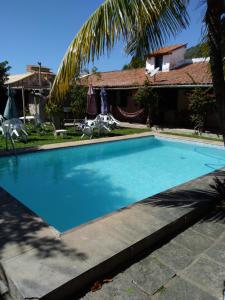 A piscina localizada em Pousada Roça Velha ou nos arredores