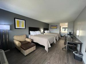 Ένα ή περισσότερα κρεβάτια σε δωμάτιο στο Quality Inn +8 φωτογραφίες