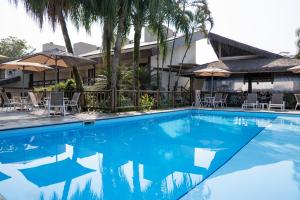 A piscina localizada em Pousada Sol e Mar ou nos arredores