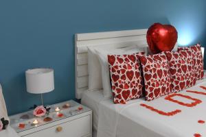 Cama ou camas em um quarto em Pousada Rosa dos Ventos Juquehy
