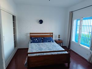 Postelja oz. postelje v sobi nastanitve House with exceptional view of the Mediterranean