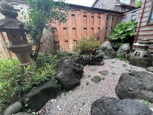 Zahrada ubytování ゲストハウス黒島