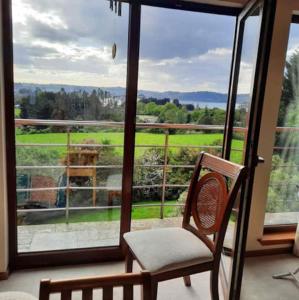 Φωτογραφία από το άλμπουμ του Suite abierta todo el año con vistas al campo, lago y ciudad σε Puerto Varas