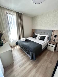 En eller flere senge i et værelse på Sorrento E 1 2 Sveti Vlas