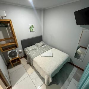 Postel nebo postele na pokoji v ubytování Hostal Casa Laredo