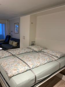 Ένα ή περισσότερα κρεβάτια σε δωμάτιο στο Haus Seelord Wohnung 38