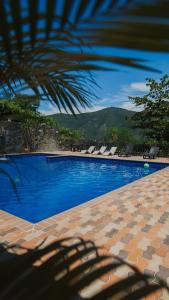 Bazén v ubytování Hotel Bosque Blue nebo v jeho okolí