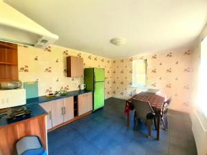 Kuchyň nebo kuchyňský kout v ubytování Hotel K.V.N.