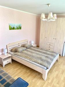 Postel nebo postele na pokoji v ubytování Hotel K.V.N.