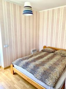 Postel nebo postele na pokoji v ubytování Hotel K.V.N.