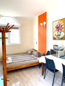 Postel nebo postele na pokoji v ubytování Hotel K.V.N.