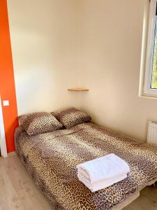 Postel nebo postele na pokoji v ubytování Hotel K.V.N.