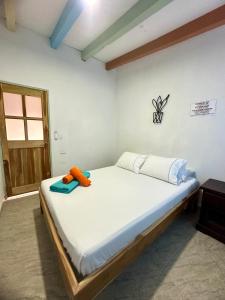 Postel nebo postele na pokoji v ubytování Hotel Bosque Blue