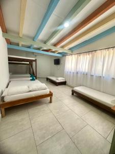 Postel nebo postele na pokoji v ubytování Hotel Bosque Blue