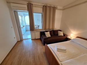 Ένα ή περισσότερα κρεβάτια σε δωμάτιο στο Vera