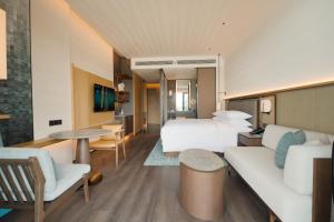 TV a/nebo společenská místnost v ubytování Zhuhai Dong'ao Island Marriott Resort and Spa