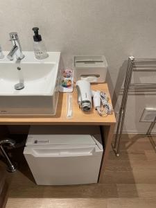 Kuchyň nebo kuchyňský kout v ubytování OHWA hostel minowa station