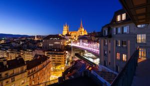 Nespecifikovaný výhled na destinaci Lausanne nebo výhled na město při pohledu z hotelu