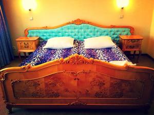 Giường trong phòng chung tại Druzhba Hotel