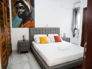 Postel nebo postele na pokoji v ubytování Modern and Cosy Apt in Abidjan