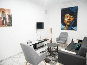 Posezení v ubytování Modern and Cosy Apt in Abidjan