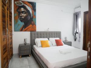 Postel nebo postele na pokoji v ubytování Modern and Cosy Apt in Abidjan