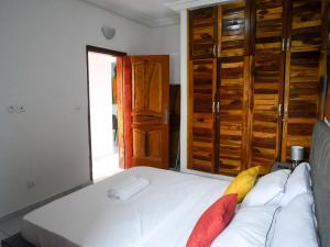 Postel nebo postele na pokoji v ubytování Modern and Cosy Apt in Abidjan